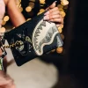IA AFRICAN INTELLIGENCE SHARKS OF THE GOLD OCEAN CROSSOVER CLUTCH – COLLABORAZIONE SANDFLOWER