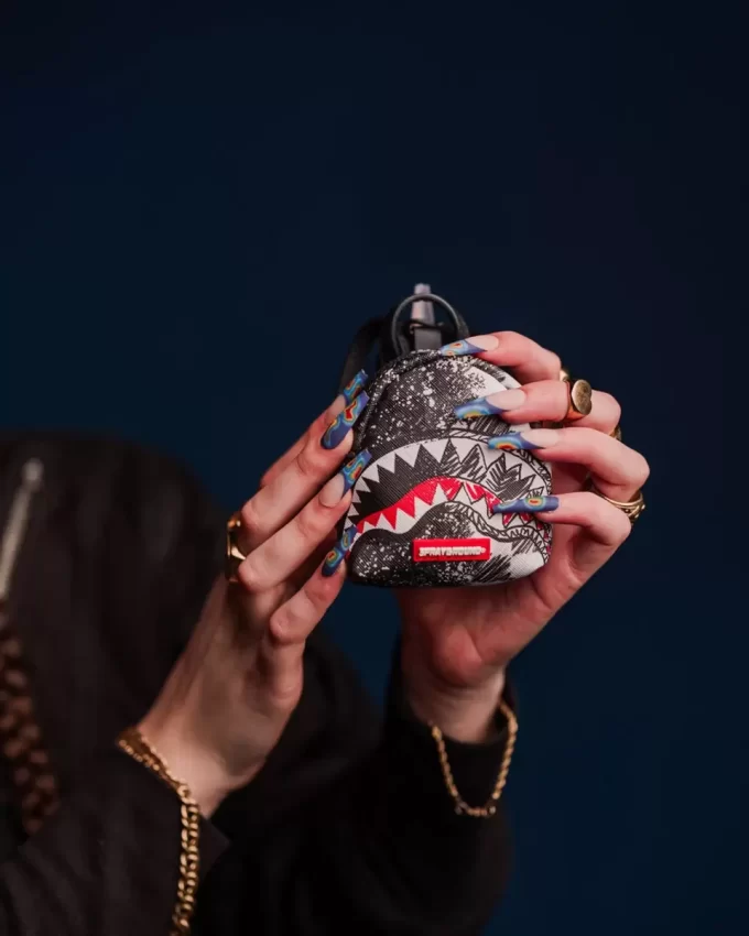 PORTACHIAVI CON ZAINO A QUADRI E SCRIBBLE DRIBBLE