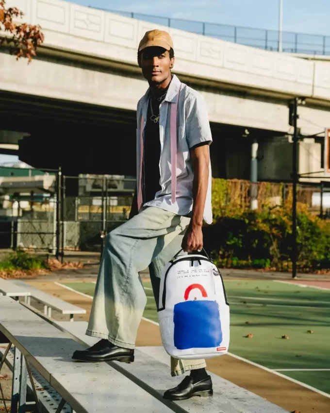 ZAINO ARTISTICO CON BORSA BLU GRANDE DI KEITH HARING