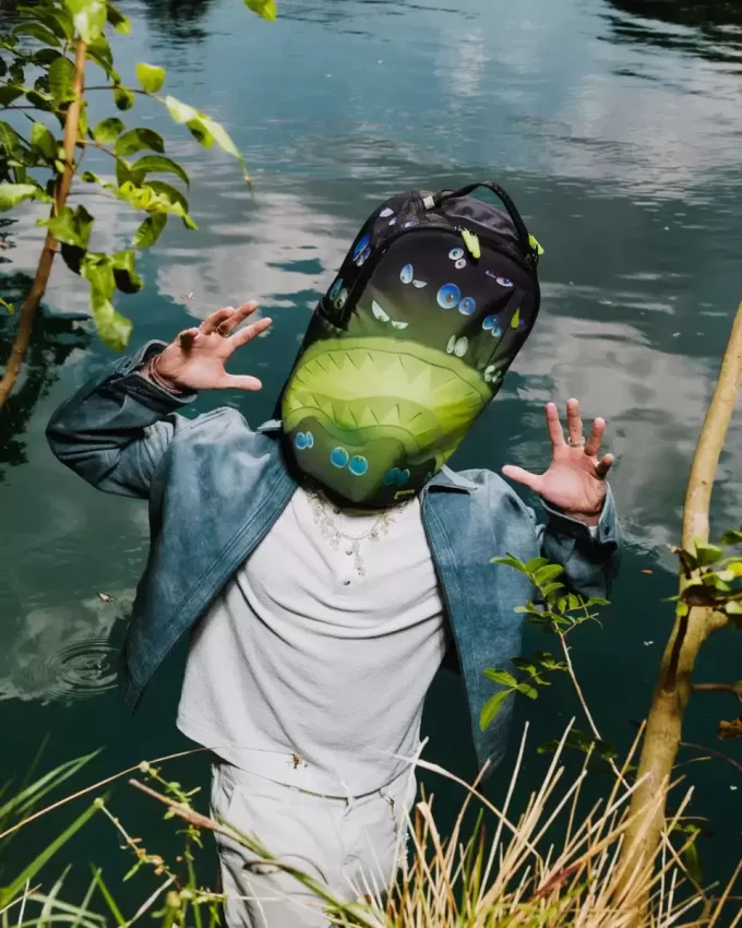 ZAINO DLXR CON OCCHI LUMINOSI (BRILLANTE AL BUIO)